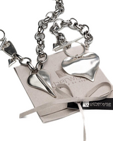Chunky silver love necklace featuring a large, sculpted heart pendant on a heavy-gauge stainless steel chain.