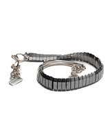 Silver hematite wrap bracelet featuring polished hematite beads, curved metal bars, and an adjustable chain for a layered look.