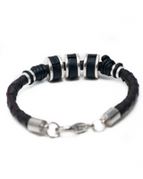 Men's bracelet featuring braided dark brown PU leather and silver-plated metal elements with a slightly adjustable fit.