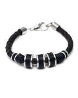 Silver-plated metal rings and dark brown PU leather form a stylish men's bracelet with an adjustable clasp.