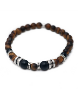 Beaded bracelet with brown, black, and silver beads on a white background
