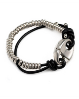 Bracelet with silver beads and black cord on a white background