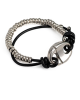 Bracelet with metal clasp on a white background
