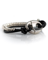 Bracelet with silver clasp and black cord on a white background