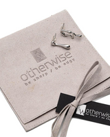 Silver earrings on a 'otherwise' branded box with a bow