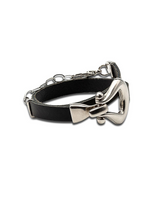 Black leather dog collar with silver metal clasp on a white background