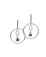 Elegant loop earrings featuring a silver-tone design with a dangling Austrian crystal pendant in Silver Night color.