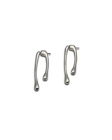 Minimal chic silver earrings in irregular geometric droplet shape, lightweight and modern design, ideal for day-to-night wear.