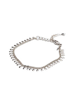 Dainty 999 silver antique plated anklet with small round charms, featuring an adjustable chain for a customized fit.