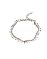 Dainty 999 silver antique plated anklet with round charms and adjustable chain, perfect for beach vacations or casual wear.