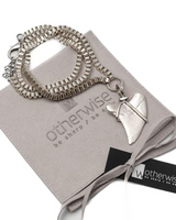 Multi-layer wrap bracelet featuring an oxidized silver Great White Shark tooth pendant and heavy metal chains.