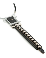 Necklace with black leather strap and silver beads on a white background