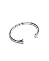 Silver plated open bangle bracelet with rounded tips, made of hypoallergenic zamak brass metal.