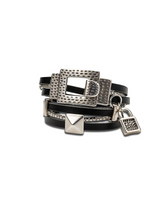 Black leather wrap-around bracelet featuring a hammered silver clasp and padlock charm, with layered chain details.