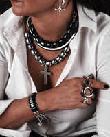 Layered hematite leather choker set featuring a silver beads choker, gunmetal hematic choker, and black leather choker.