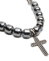 Hematite leather choker set featuring a silver beaded choker with textured cross, gunmetal choker, and black leather choker.