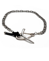 Three-piece silver curb statement jewelry set featuring a silver plated curb bracelet, 48 cm necklace, and adjustable geometric ring.