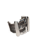 Chunky statement bracelet featuring large zamak slider bars and a flat brass chain in antique silver plating.