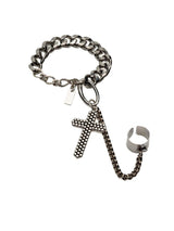 Stainless steel chain bracelet with a large Gothic cross pendant and an adjustable ring, featuring antique silver plating.