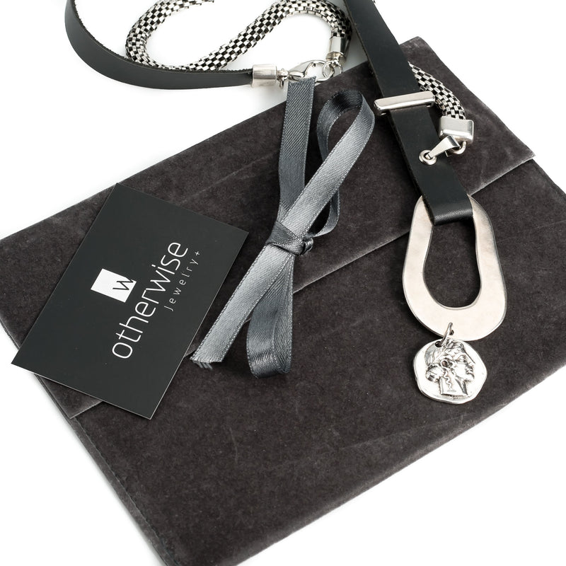 Soft black leather necklace with irregular shaped design and coin pendant (NC-1092)​